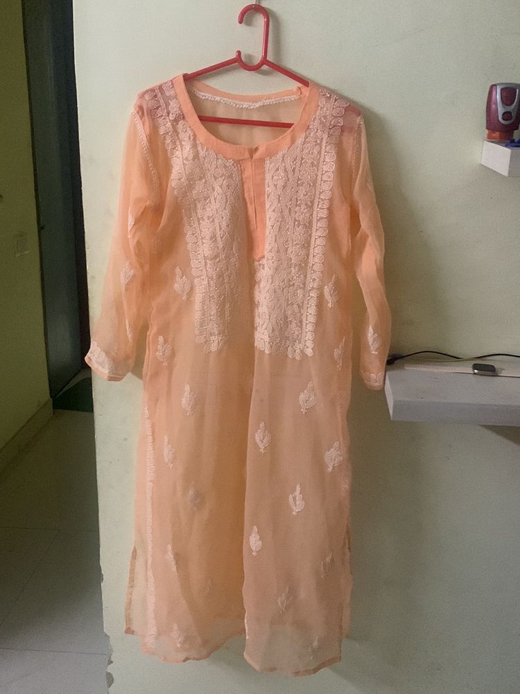 Peachy Orange Transparent Chikankari Kurti With inner