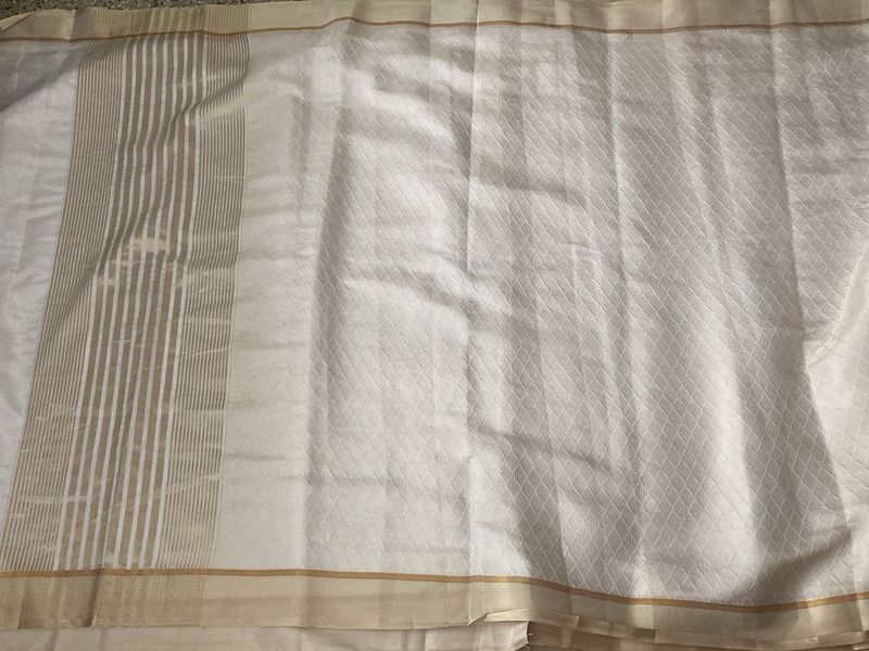 New Off White Golden Zari Saree For Grabs