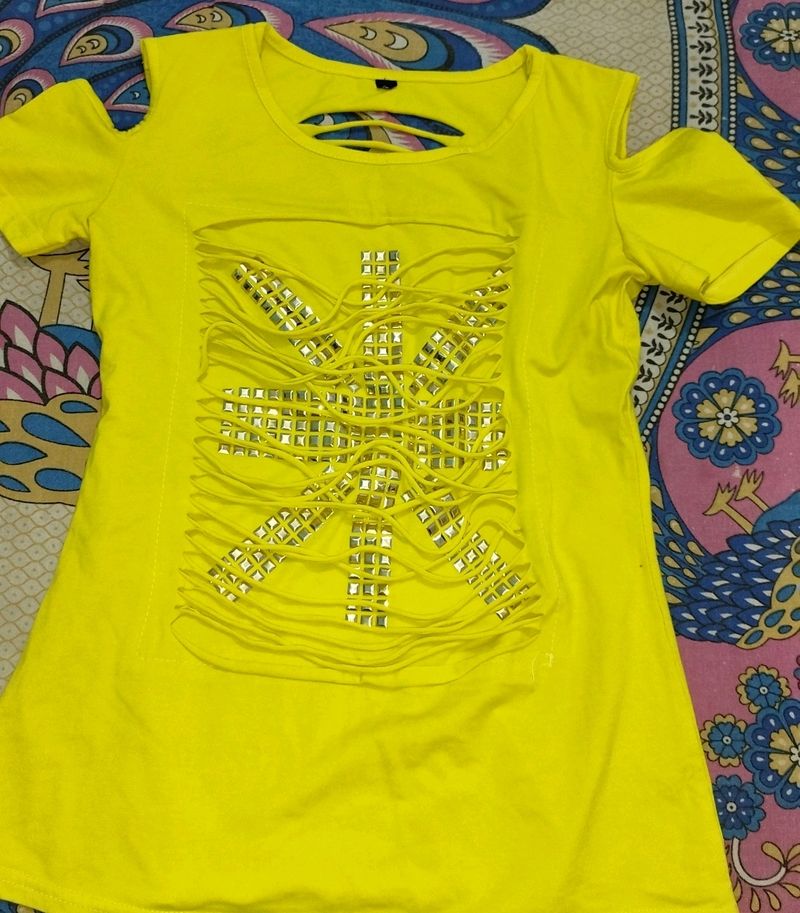 A Yellow Color Shoulder Cut Top.