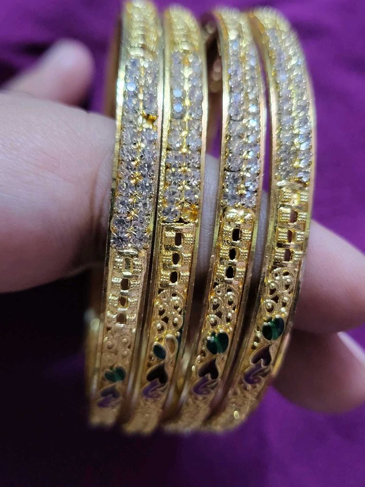 4 Bangles 1 Bracelet Never Used Before