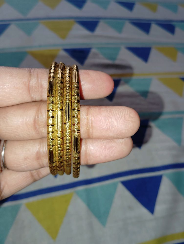 4 golden Bangles