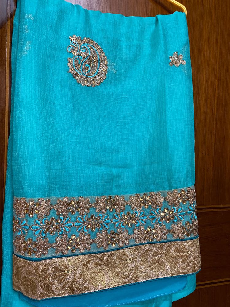 cyan saree with stitched blouse