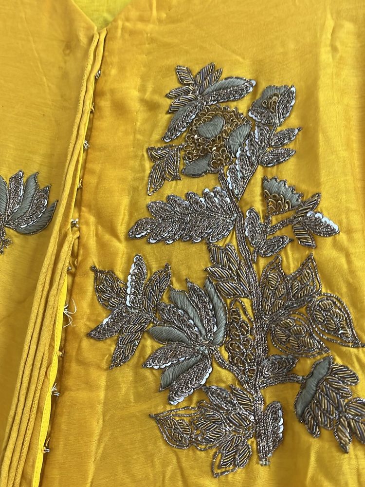 A Yellow Kurta Set With Long Trail