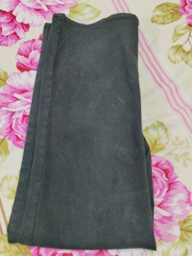 Black Jeans With Faded Pattern On Front