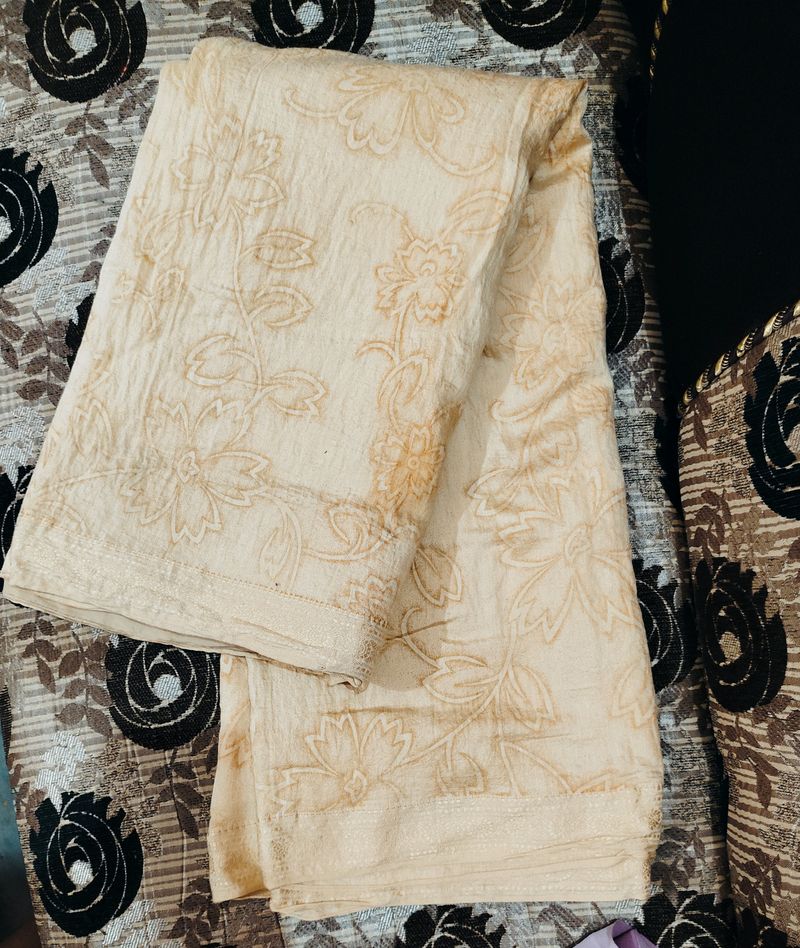 Cream Saree With Orange Prints