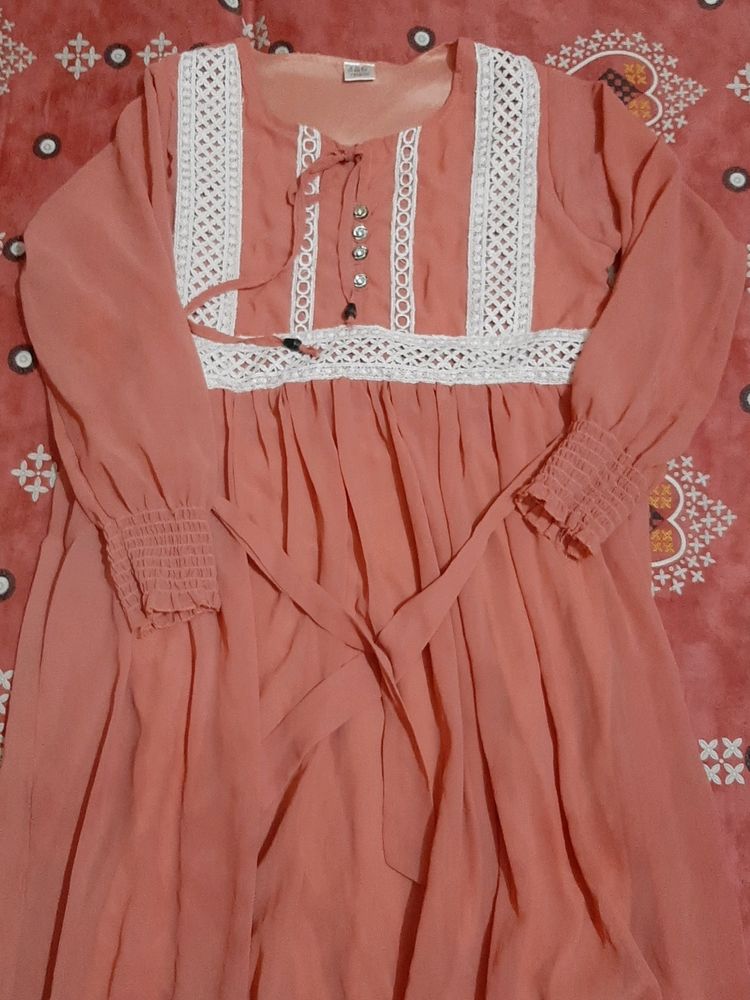 A Beautiful Peach Colour Frok Suit