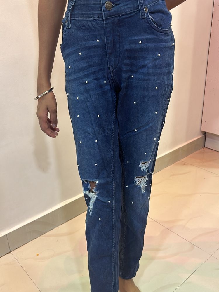 Dark blue mom fit jeans with Moti design