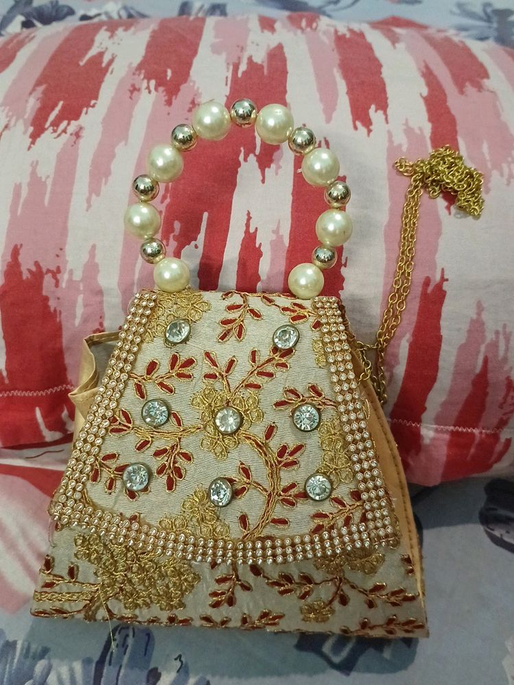 Small Clutch With Stone And Golden Embroidery Work