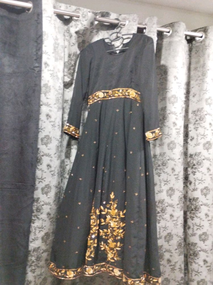 Heavy Black Gown With Work In It