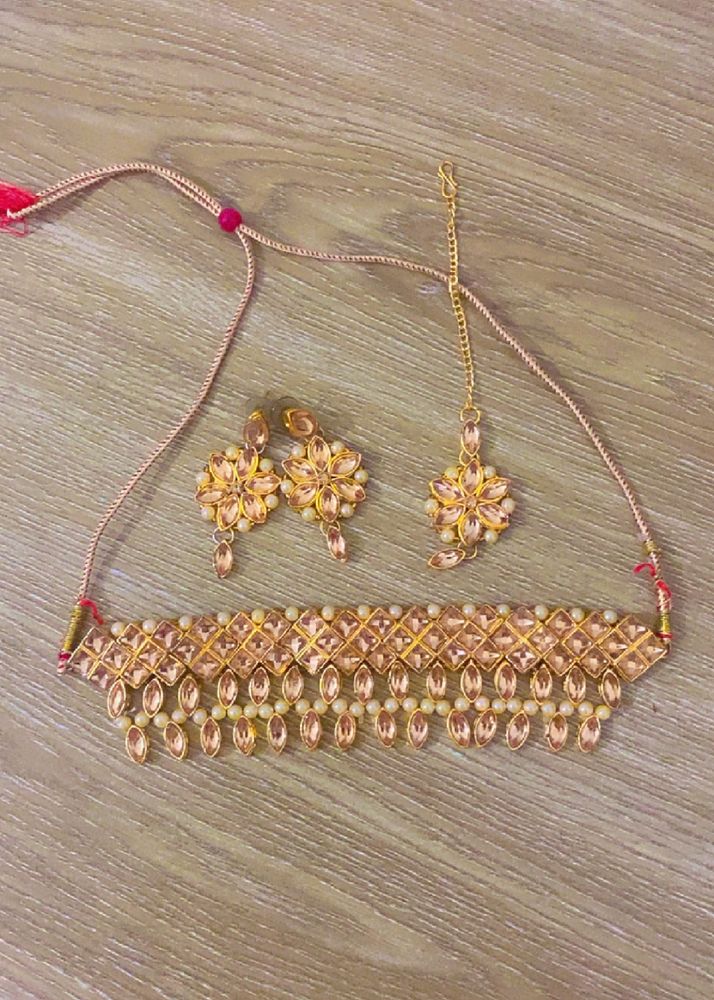 Beautiful golden  Choker Set With Mangtika