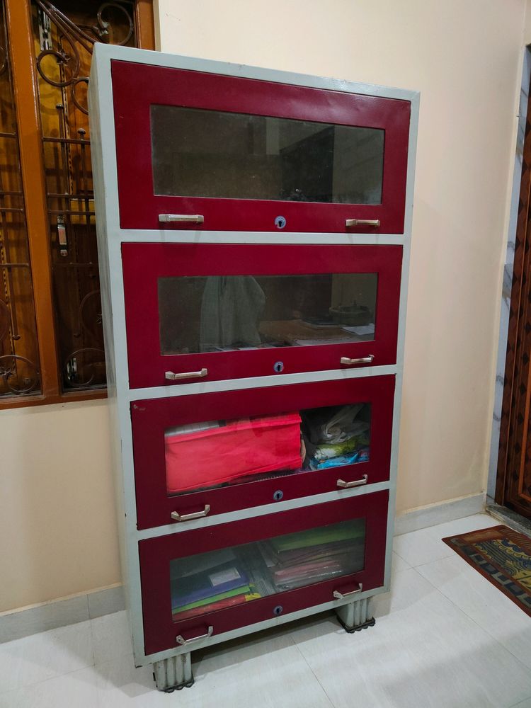 Maroon Glass Cupboard