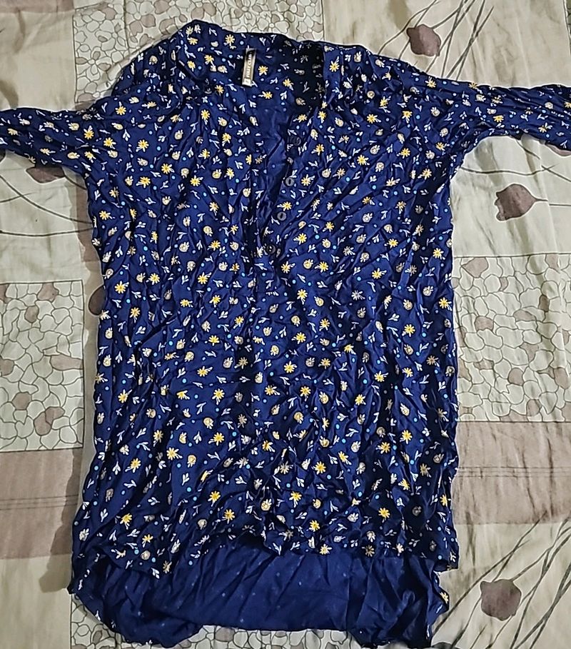 Its Navy Blue Top With White And Yellow Flowers