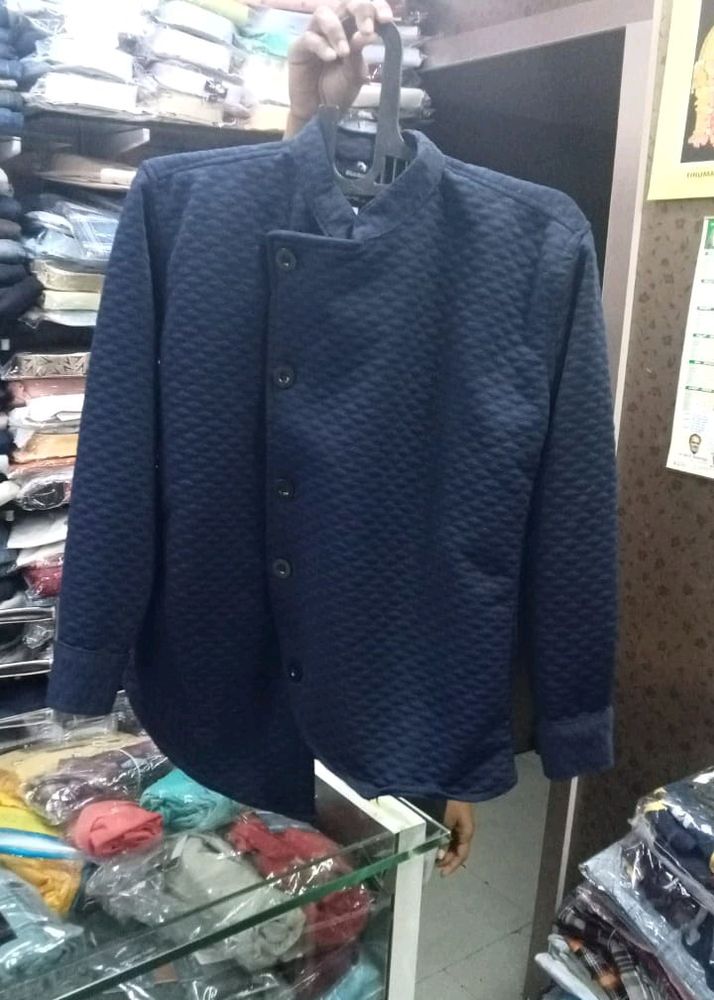 Navy Quilted Button-Up Jacket.