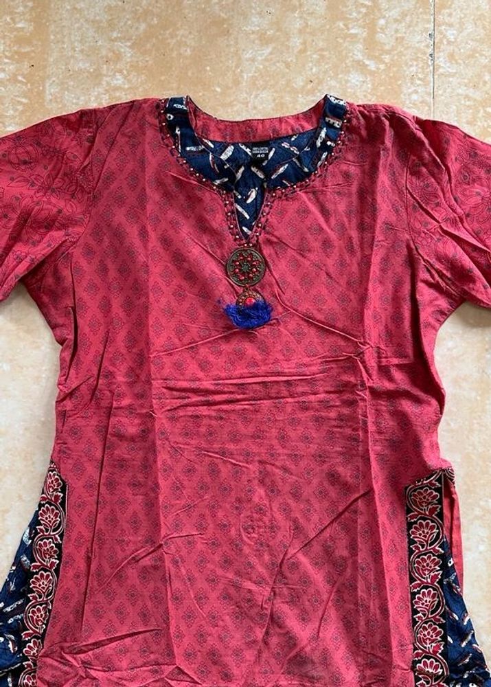 A light Festive Red Kurta Plazo Set