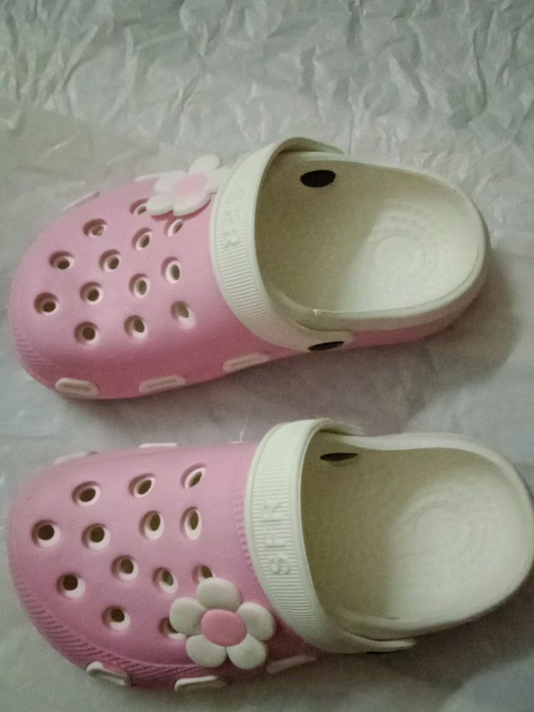 Pink Cross -size 11..6-7 years can wear.