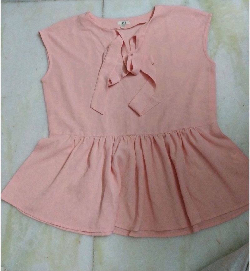 PEACH TIE UP AND PEPLUM TOP