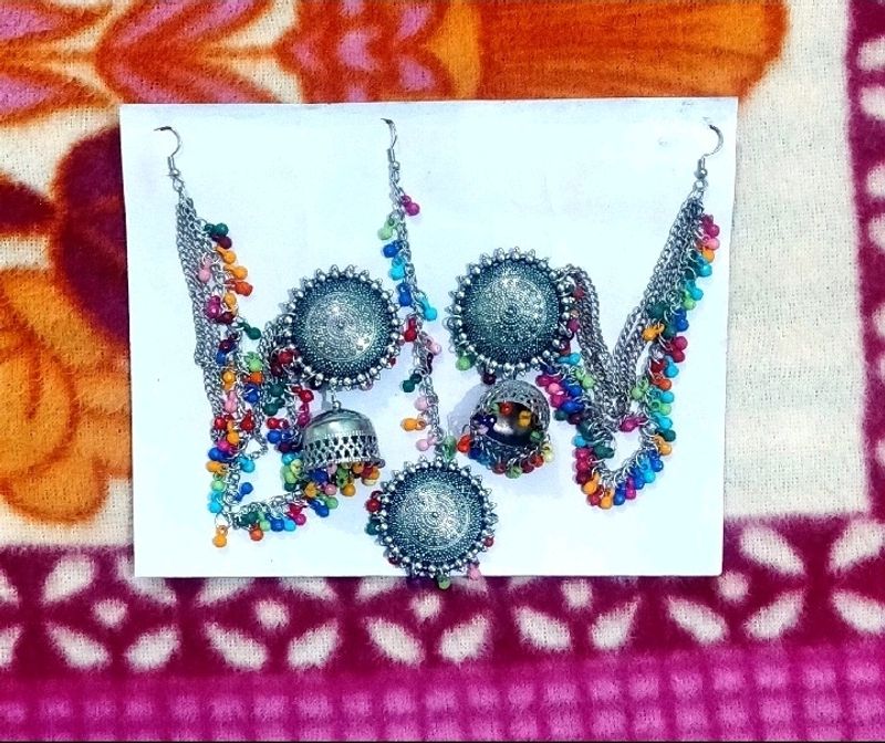 IT IS A NEW TIKKA EARRING SET.....