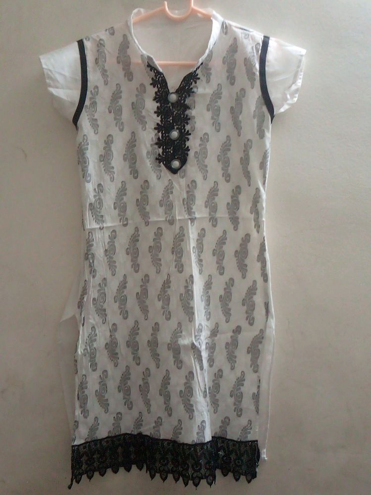 Transparent Lace designed white Kurti only needs ironing. Not much used just kept aside. No Flaws.