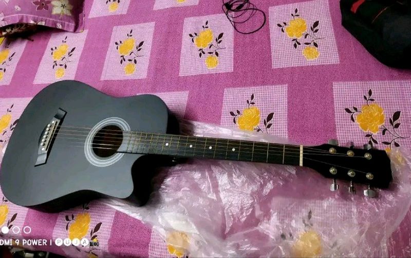 Guitar With Bag And Extra String