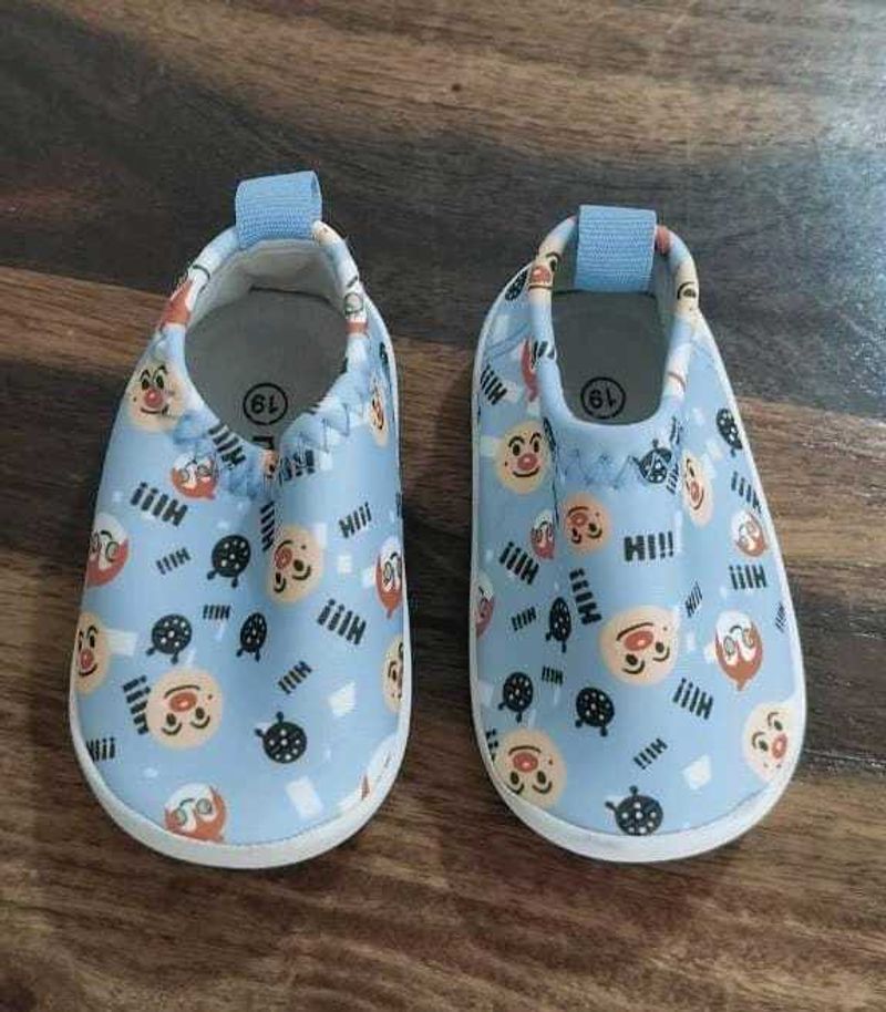 A Pair Of Kids Shoes