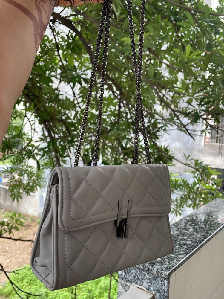 Grey sling Clutch With Stylish Lock