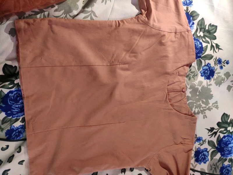 It Is a Peach Coloured Top . I Hardly Used This.