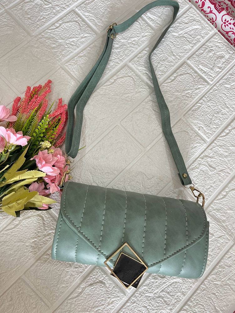 Green Roll shaped sling bag