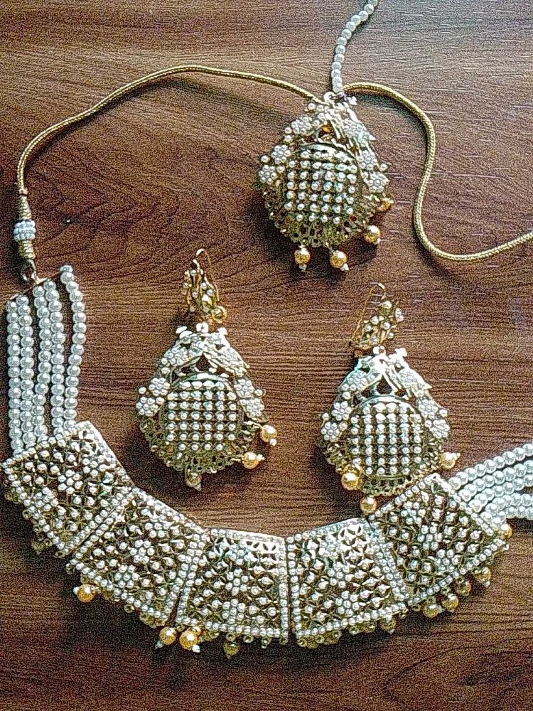 Beautiful Necklace with earrings and tikka set