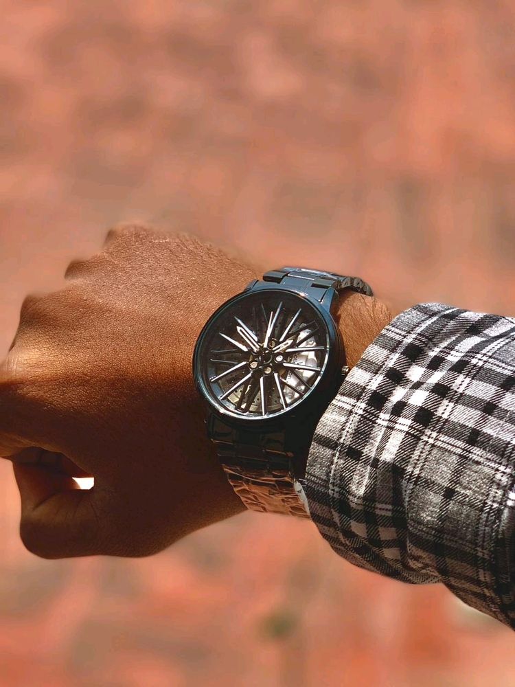 WHEEL SPINNING WATCH