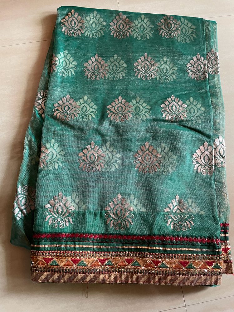 Green Color Net Saree With Simple Border