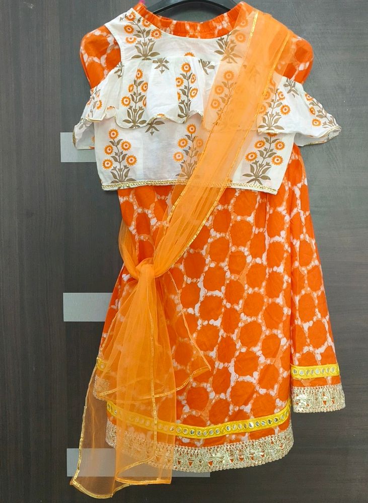 Pretty White And Orange Coloured Lehenga