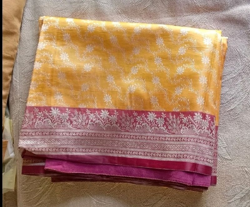 Yellow Saree With Pink Border