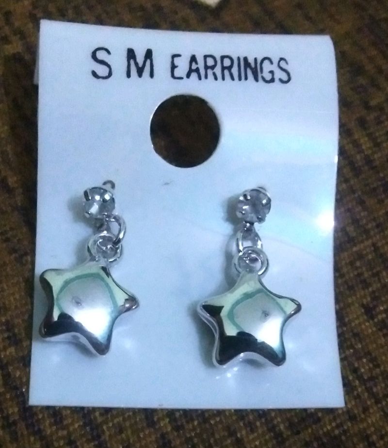 Pair Of Big And A Small Star Earrings