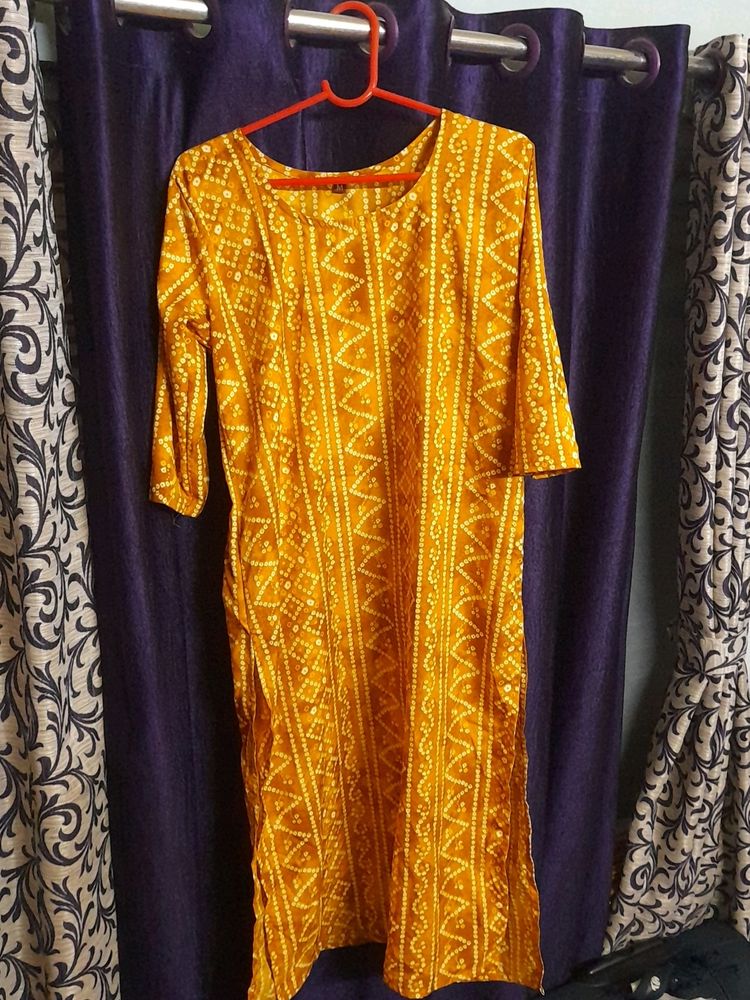 Beautiful yellow badhni print polyester kurti....N