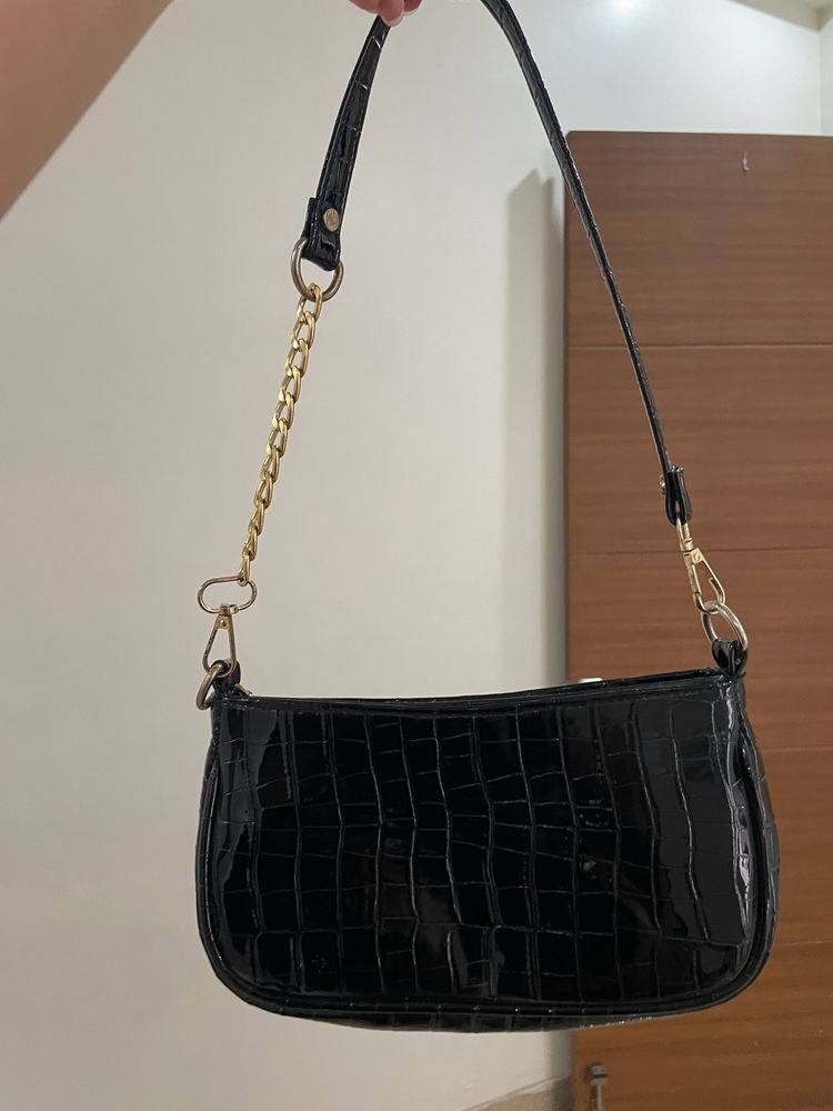 Black Leather Bag With Golden Details