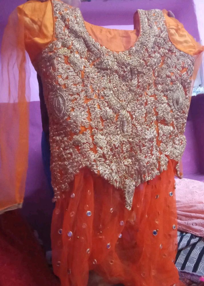 ORANGE LEHENGA CHOLI