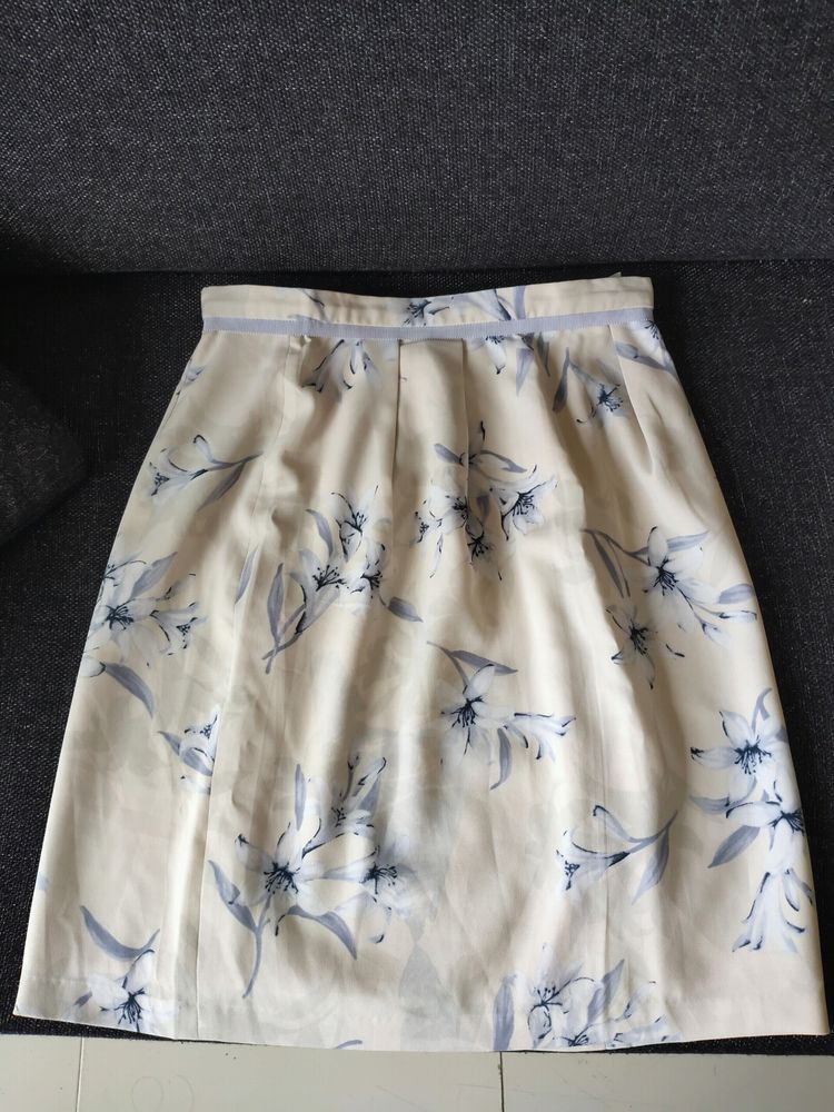 A Mini Knee Length Skirt .