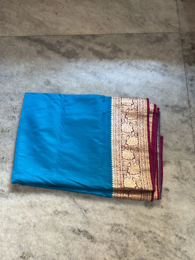 Beautiful Blue Banarasi Saree With Pink Border