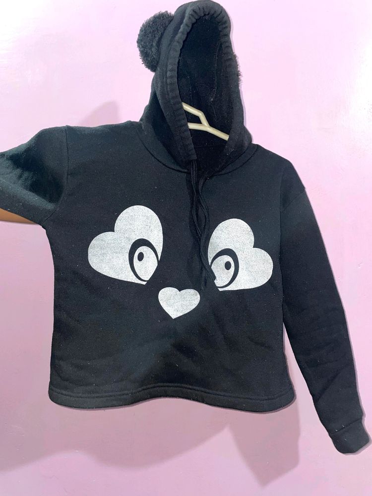 Black sweater with bunny ears