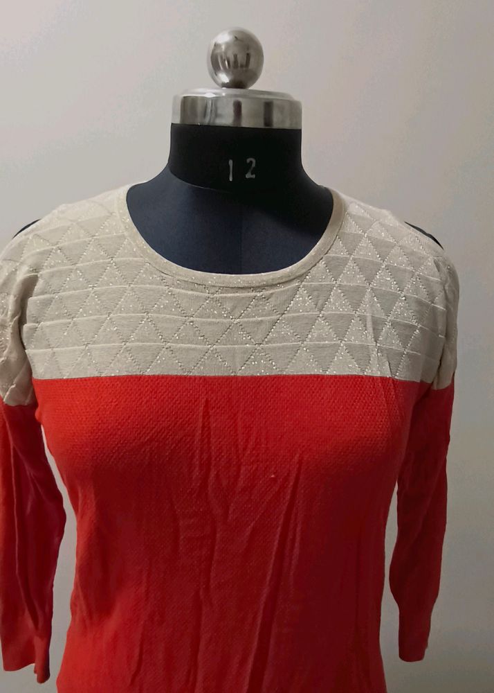 coral and cream colour top in very good condition