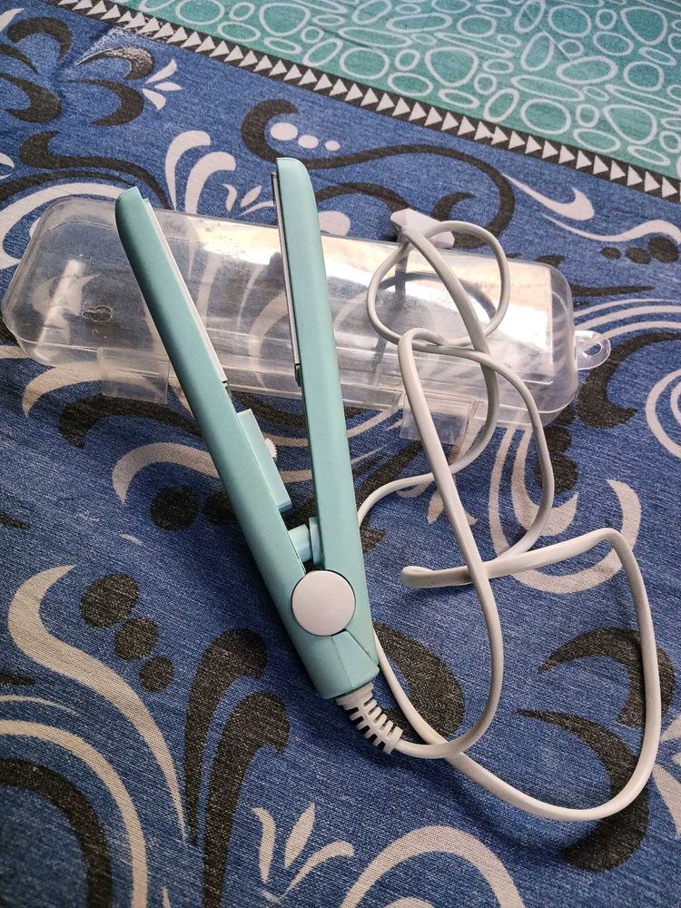 A New MINI HAIR STRAIGHTENER FOR SALE