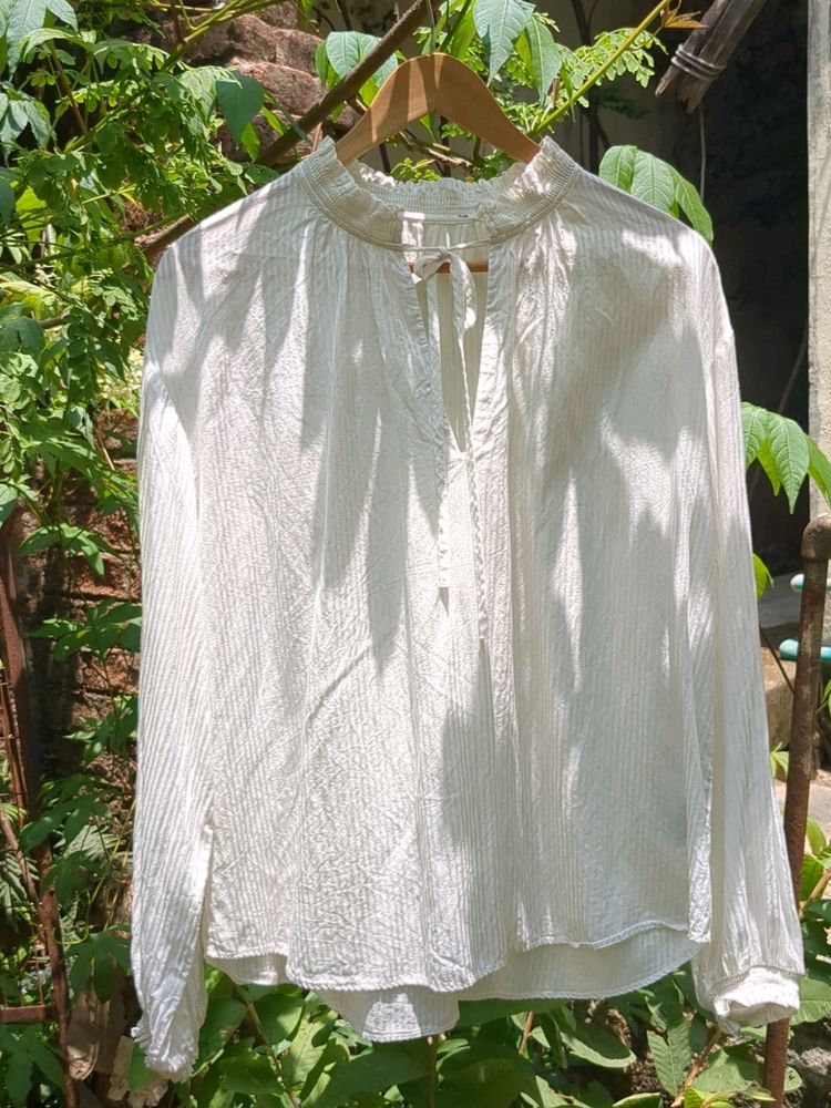 White Ruffled Blouse