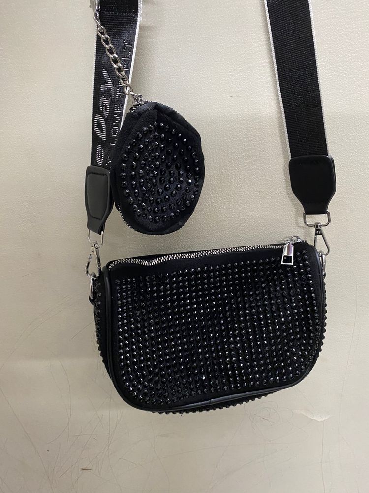 Black Coin Sling Bag.