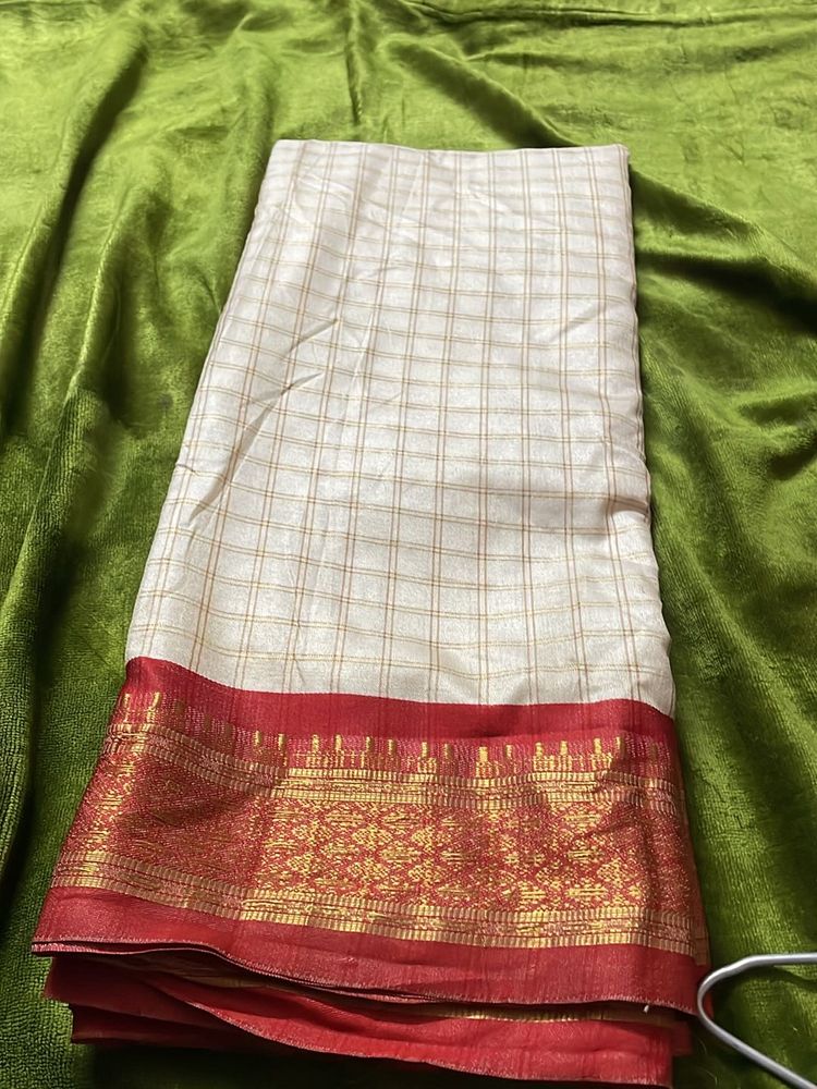 White Saree With Red Boarder