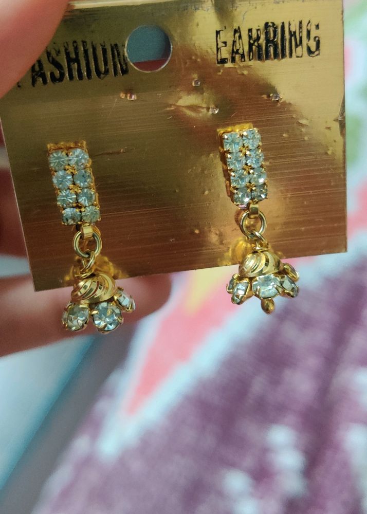 Golden Jhumki Earrings With Silver Stones