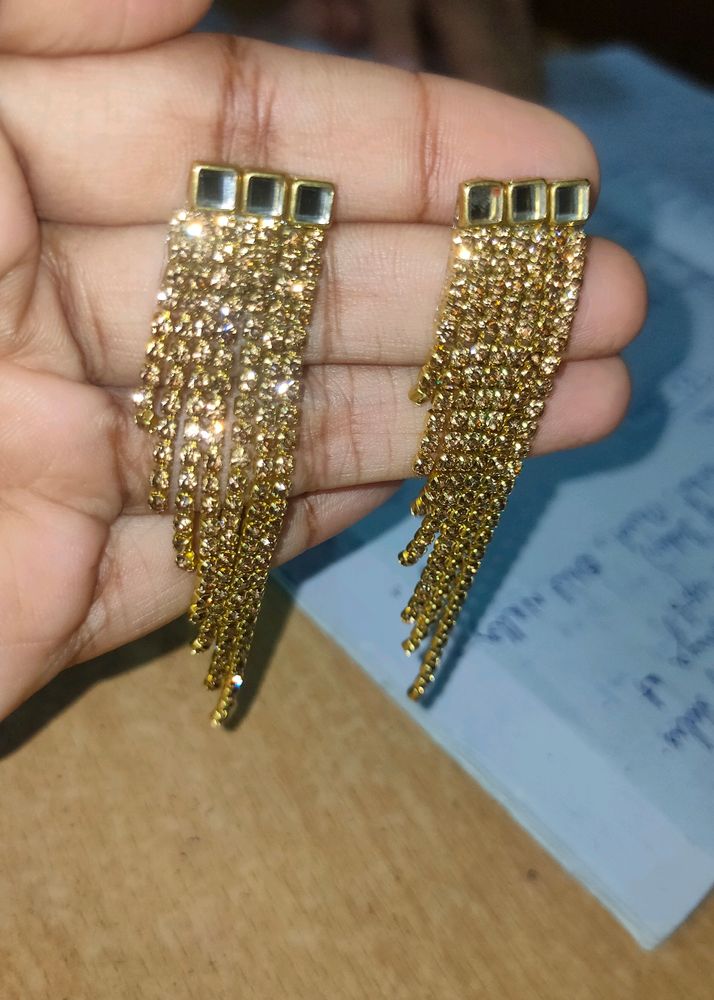 Earrings .