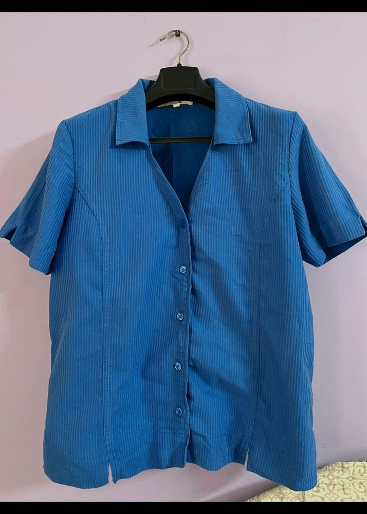 A Blue UNISEX Shirt.