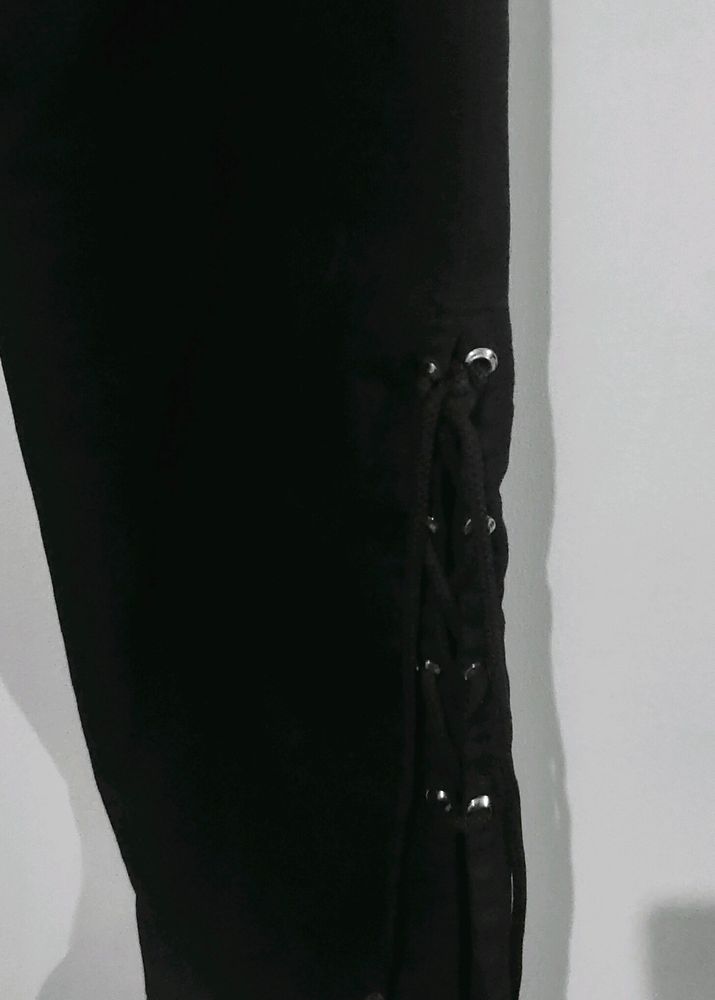 Flared Black Jeans With Cut Design