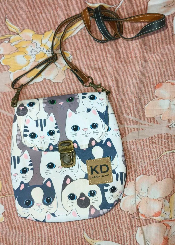 Kitty print sling bag