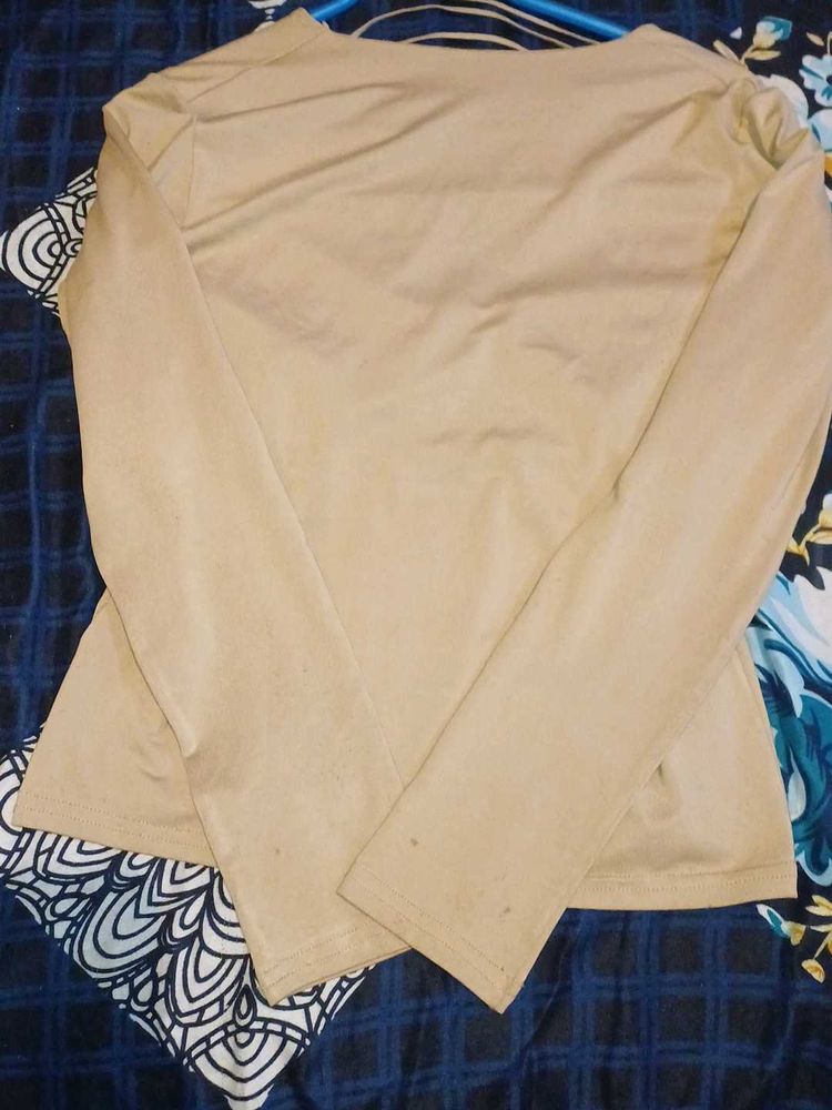 A Tan Colour t-Shirt With Designer Neck.